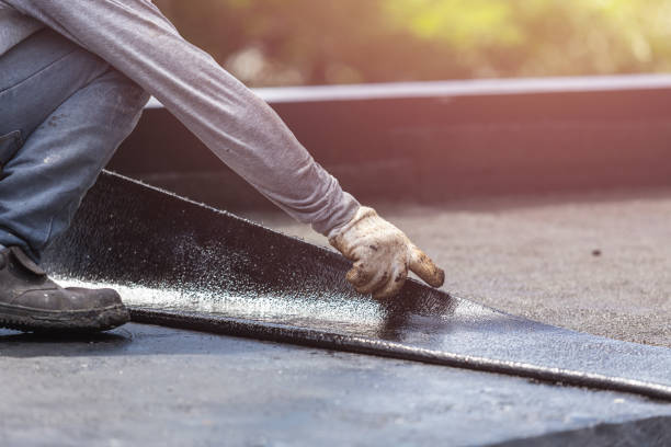 Professional Basement Waterproofing technician working in Plymouth, WI